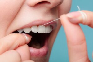 Floss Daily to Fight Cavities